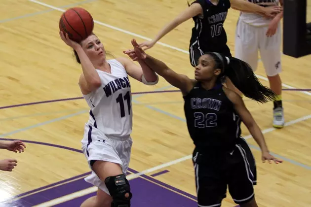 Wildcats use 59-47 win over Emerson to win tournament championship