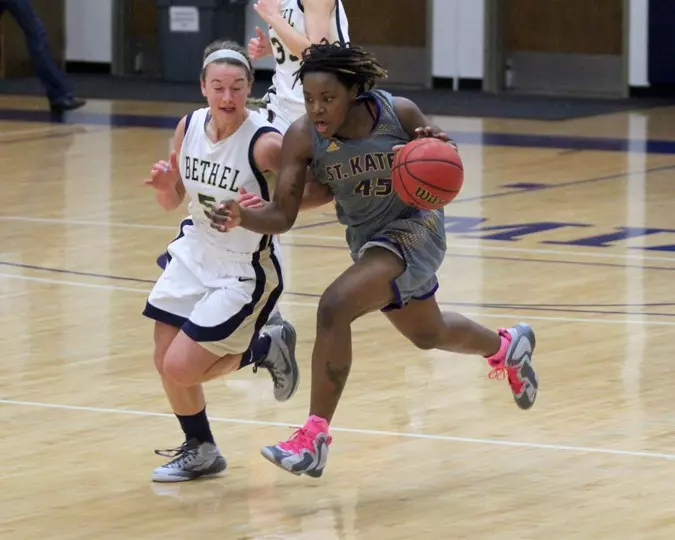 Holt leads charge in Wildcats 77-75 win over St. Olaf