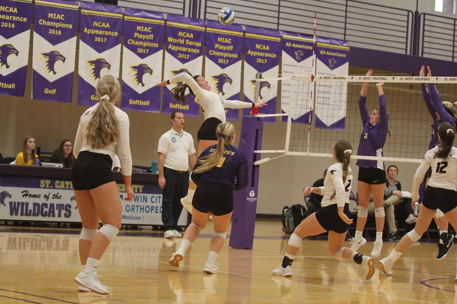 Lauren Isaacson Hitting Ball against St. Thomas