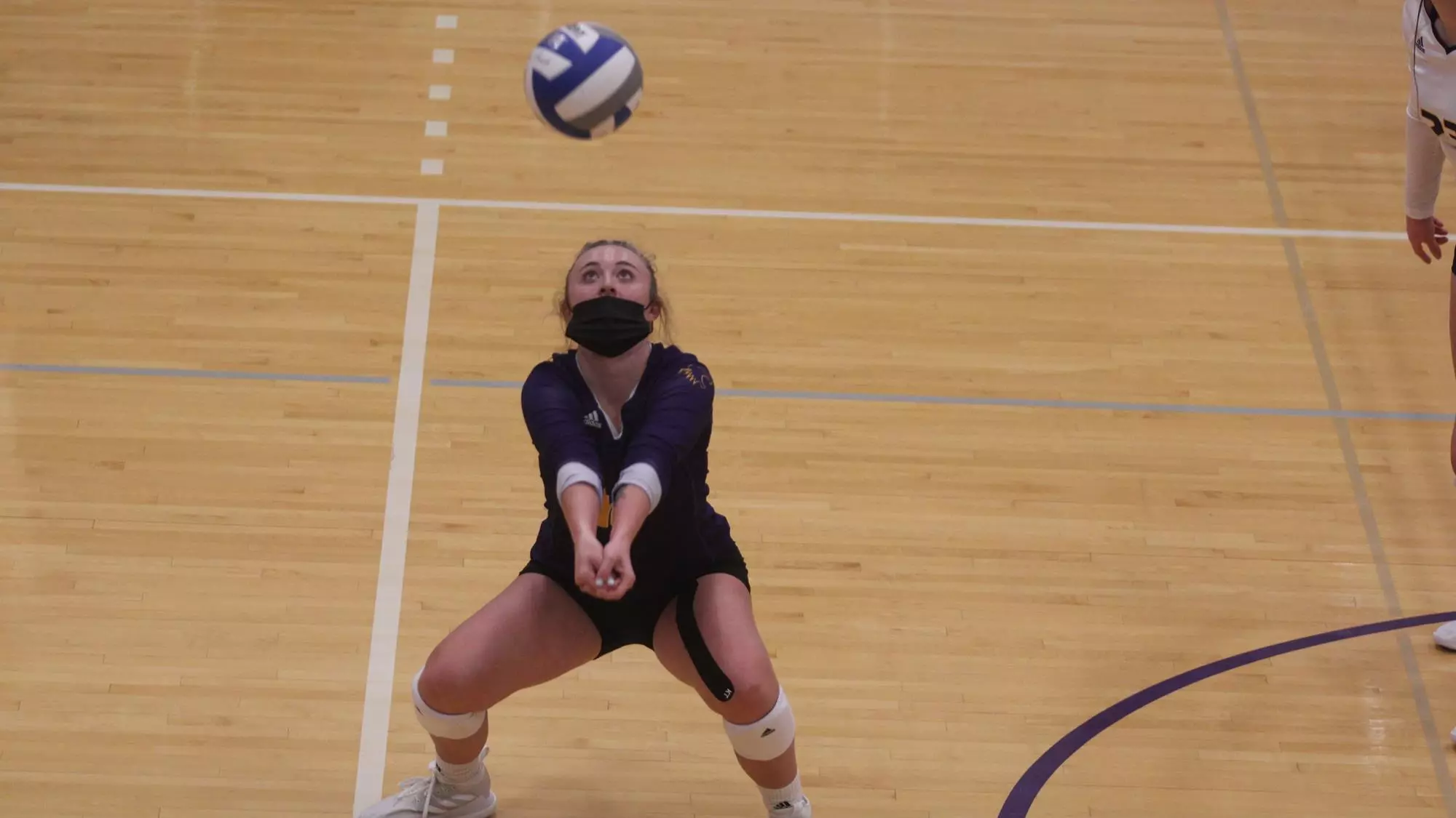 Claire Segner digging volleyball