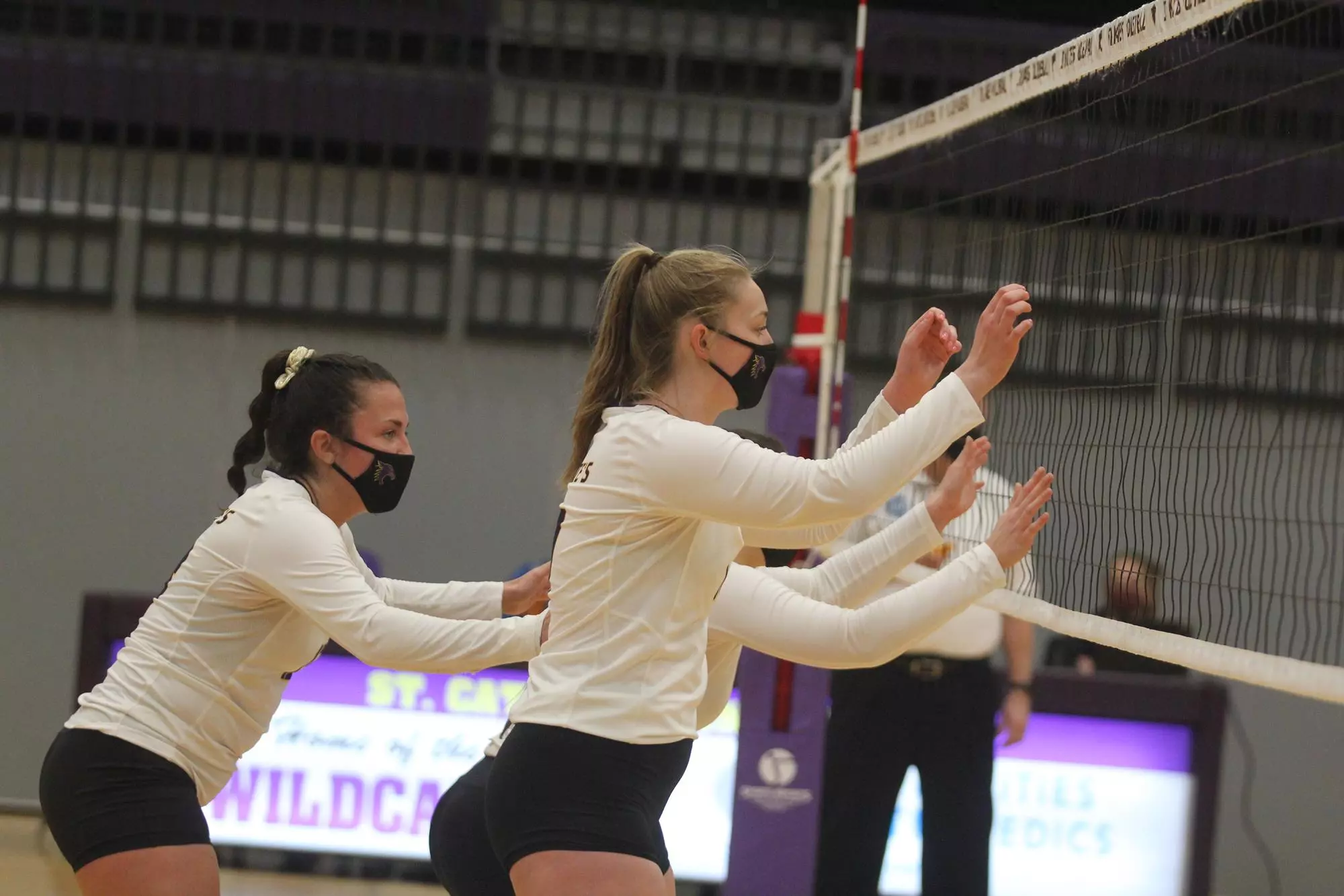 Isaacson and Tilton at the net