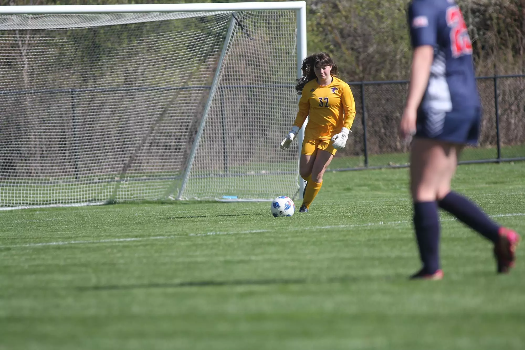 Kate Praetz at home vs macalester kicking ball out of goal