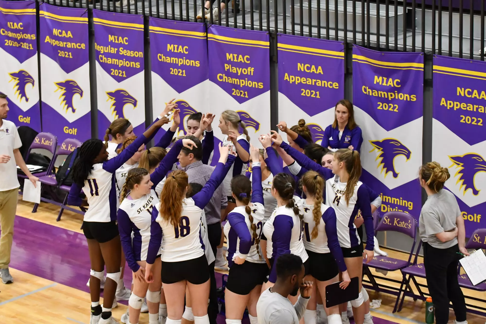 Volleyball team huddle
