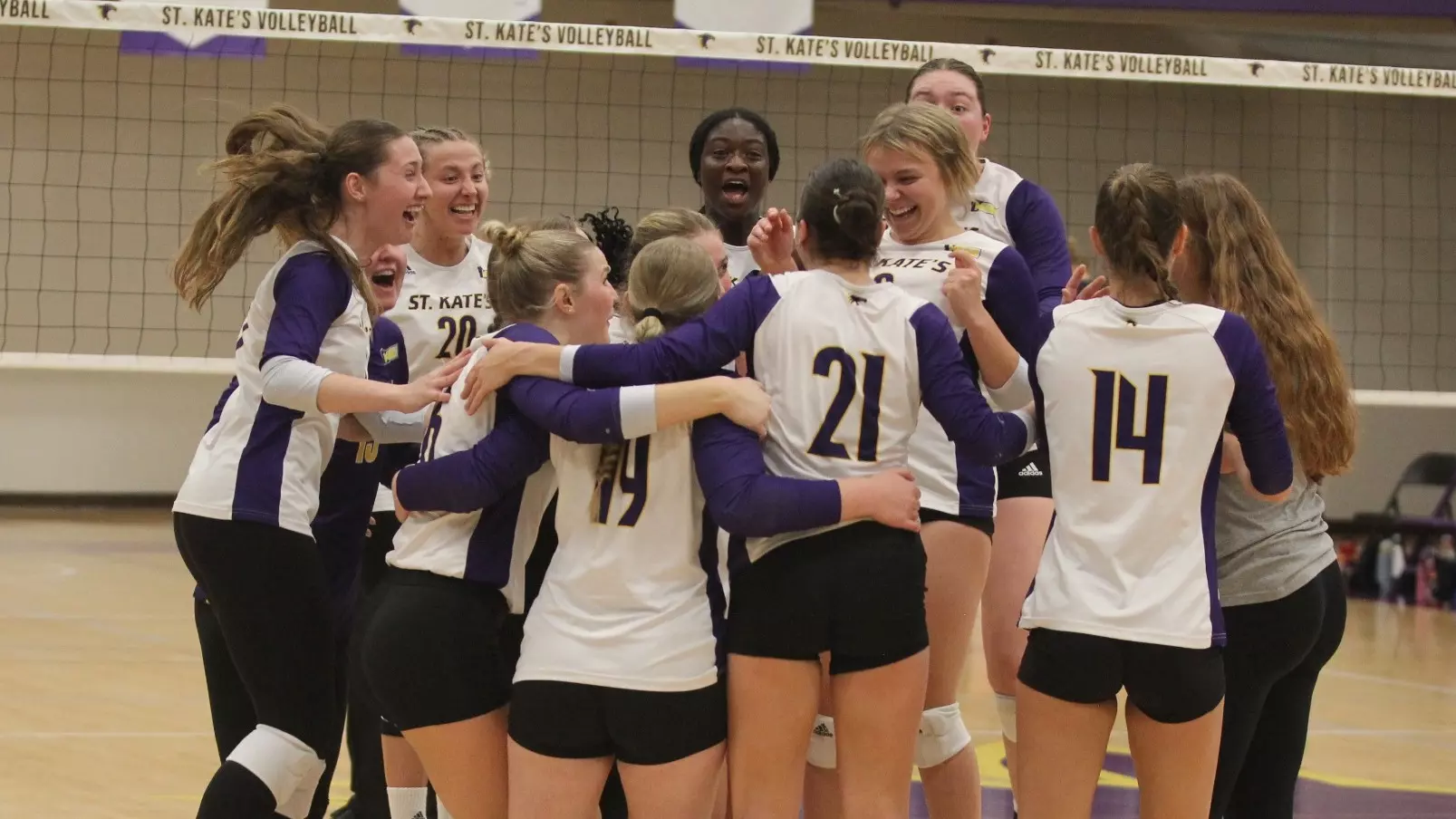 Volleyball celebrating championship berth