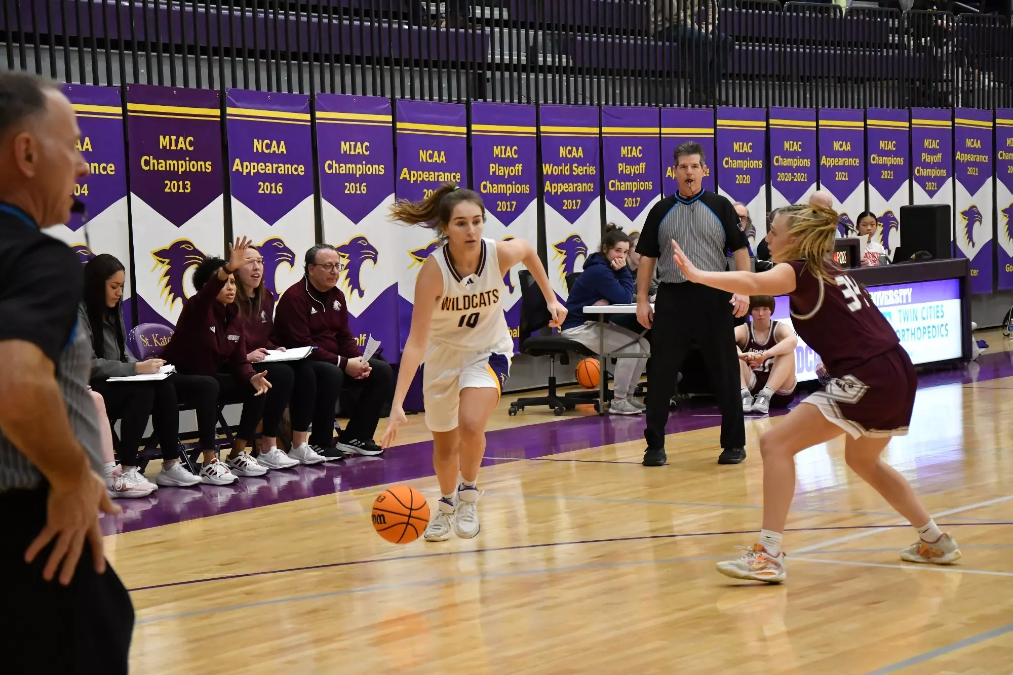 Sydney Elliott dribbling down the court 