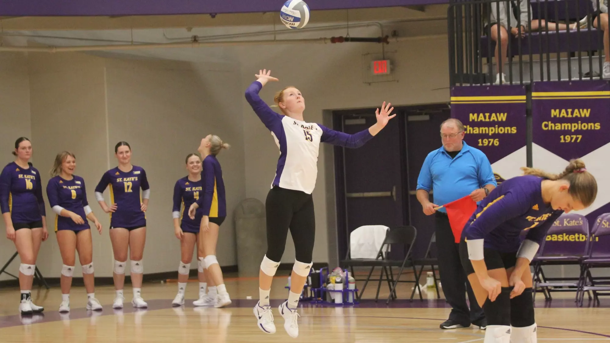 Brenna Essig serving