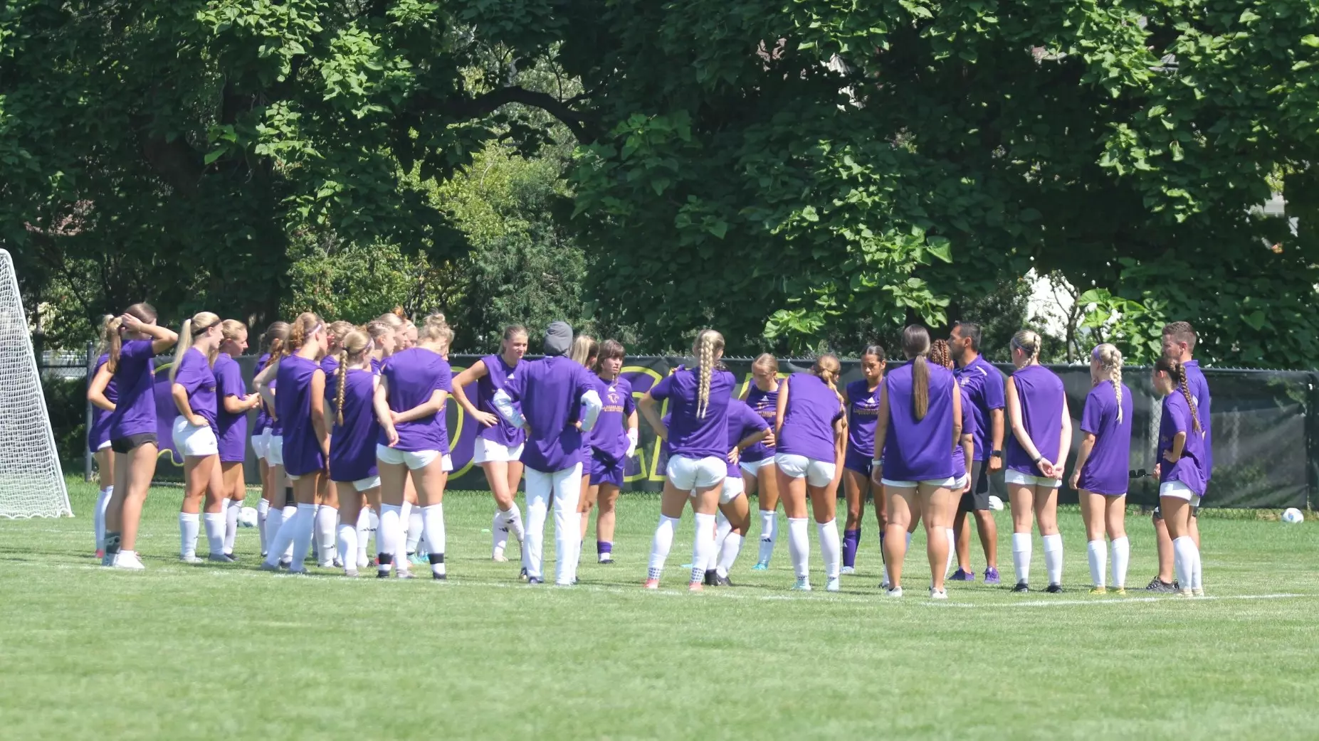 St Kates Soccer team huddling 