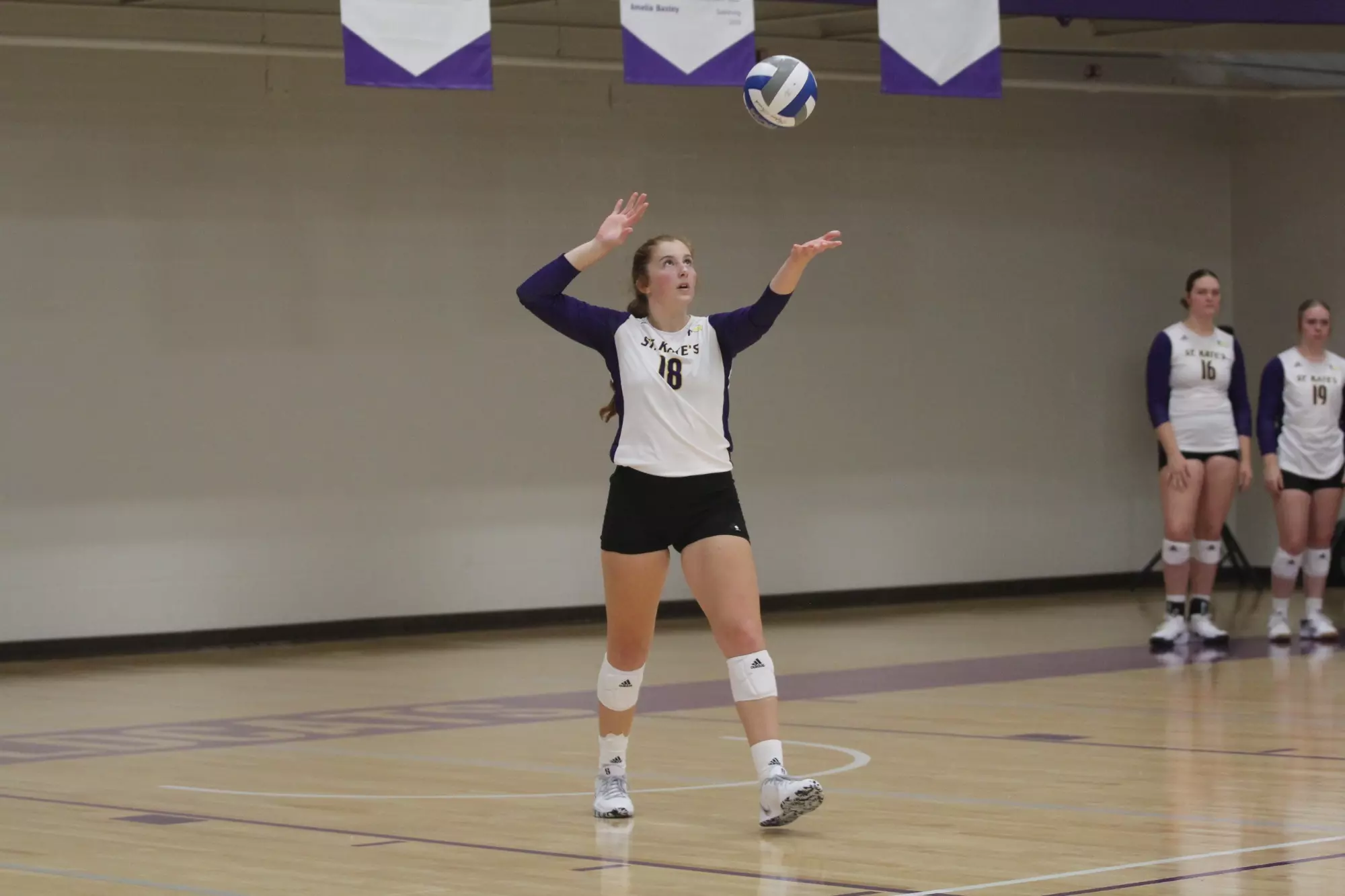 Emily Bredman serving