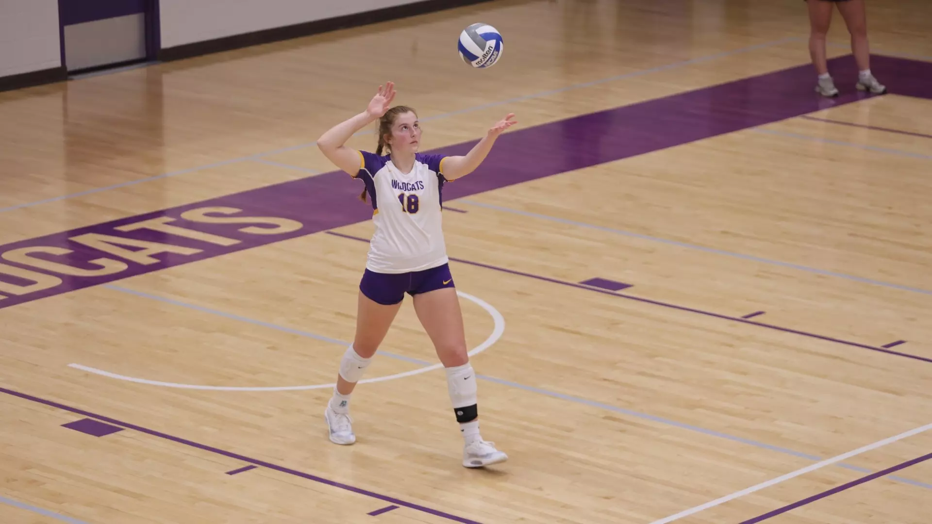 Emily Bredman serving