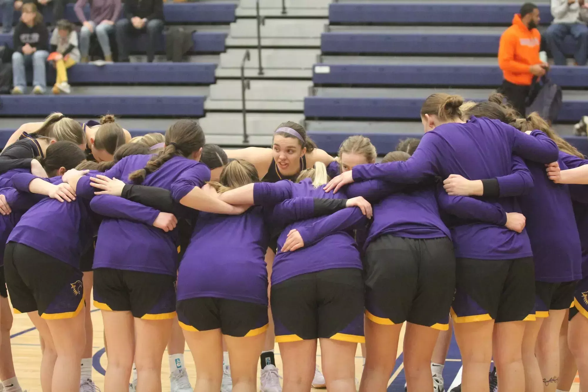 Basketball team huddle at macalester