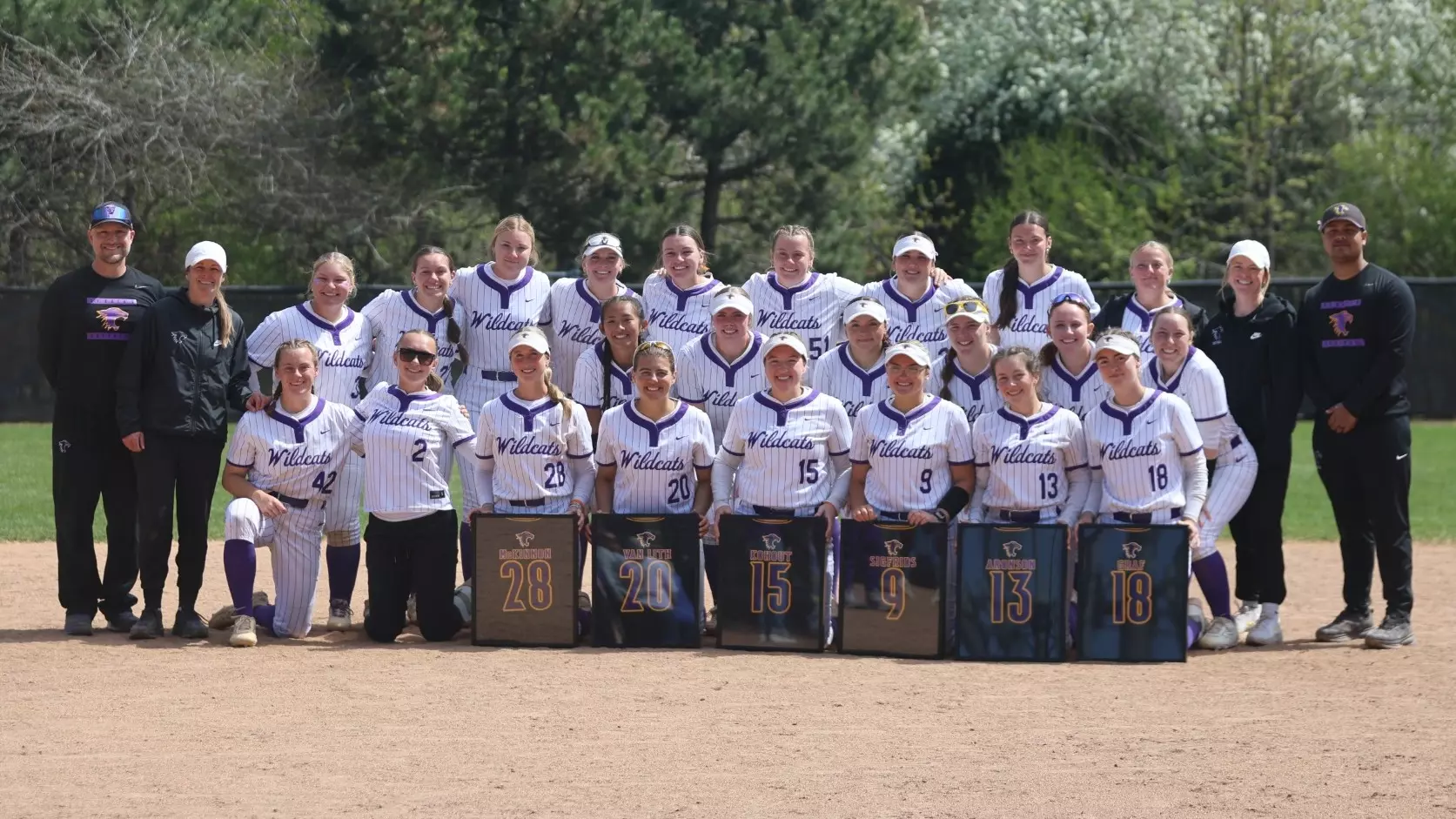 2026 softball graduating class and coaches on senior day